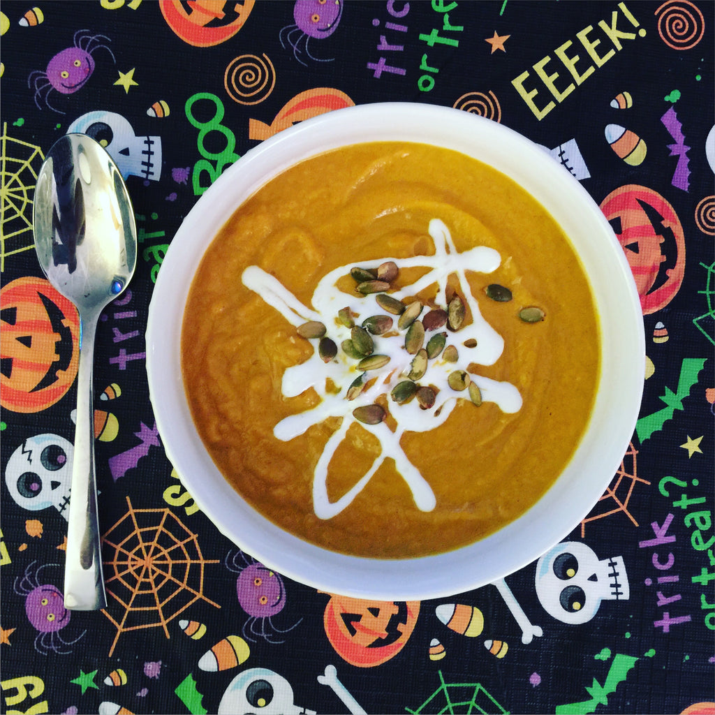 Pumpkin Coconut Soup with Cream and Truffle Topping
